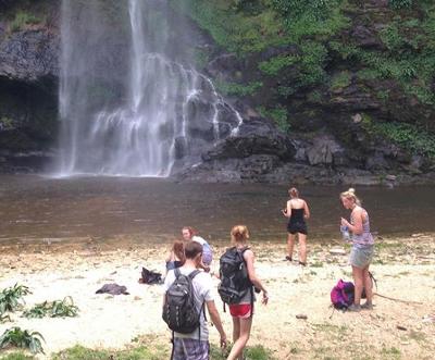 Volunteers at a local waterfall Volunteers at a local waterfall