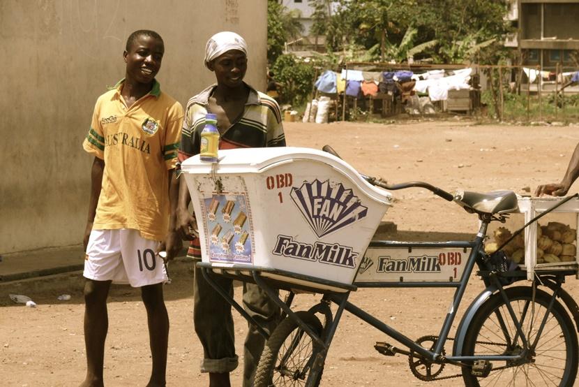 Locals selling Fan Milk from a bicycle Locals selling Fan Milk