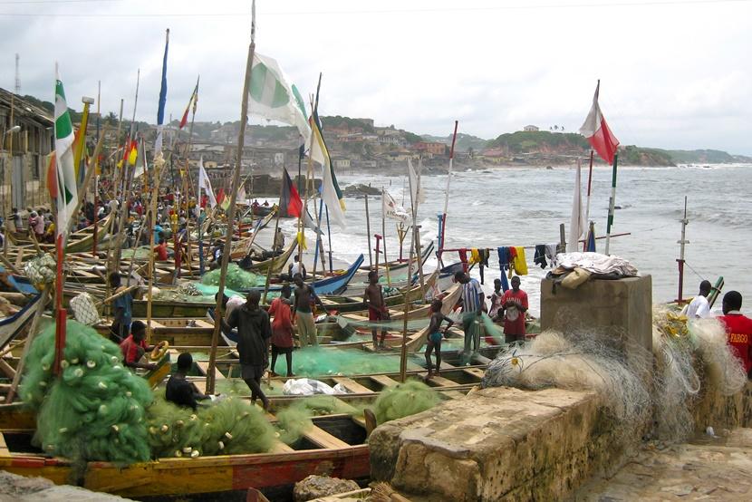Fishermen and their boats by the sea Fishing boats on the coast