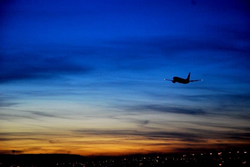 A plane shortly after take off A plane in the evening sky