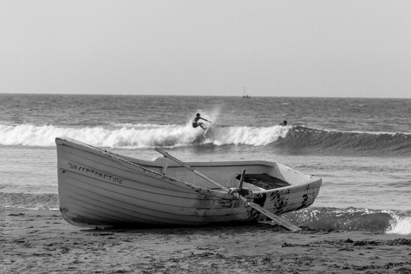 Boat on the shoreline A boat on the seashore