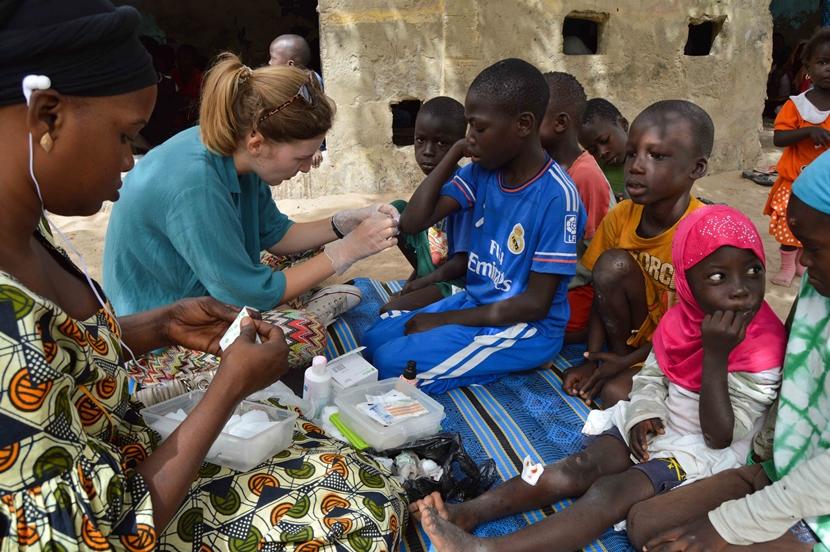 A volunteer and local staff provide medical care to children at a daara in Saint Louis, Senegal A Belgian Projects Abroad volunteer and local staff provide medical care to children at a daara in Saint Louis, Senegal