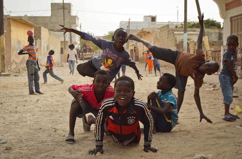 Talibe children play in the street outside the Projects Abroad Care centre Talibe boys play in the street outside the Projects Abroad Care centre in Saint Louis, Senegal