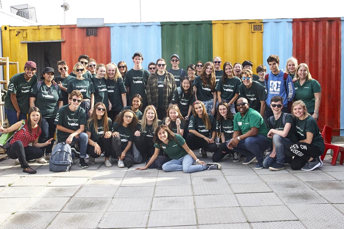A group of first time teen travellers at a placement in Cape Town, South Africa Teenage volunteers abroad, on a volunteering opportunity for first-time teen travellers in South Africa