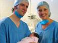 Medicine & Healthcare - Volunteers Holding a New Born Medicine & Healthcare - Volunteers Holding a New Born