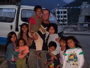 Supervisor Daniel with local children