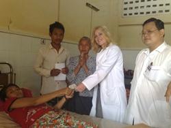 Medical volunteer with child