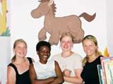 Volunteers show off their painting skills