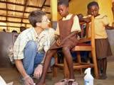 Treating wounds at Kwamoso School