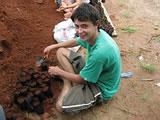 Filling mangrove seed bags
