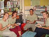 Volunteers Trying the Curry Too
