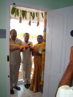 Dr GK cutting the ribbon
