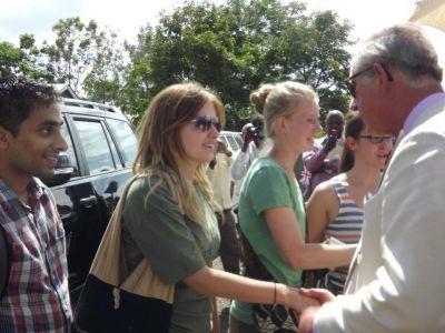 Volunteer shaking hands with Prince Charles Volunteer shaking hands with Prince Charles