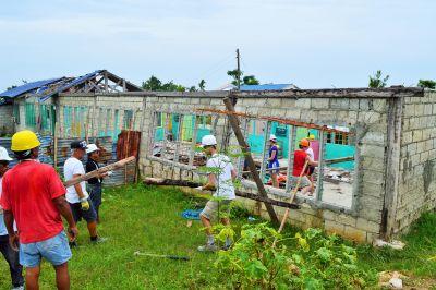Volunteers work to help rebuild lives in the Philippines Volunteers rebuild a school on Cebu Island, Philippines
