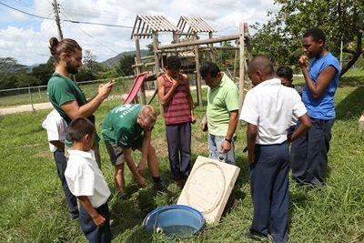 Children and volunteers work together at the schools The schools have a range of eco-friendly systems in place