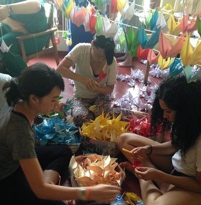 Volunteers hang up Japanese symbol of luck in Sri Lanka hospital Projects Abroad Medical volunteers make 1000 origami cranes in Kethumathi Hospital for Women in Panadura, Sri Lanka