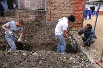 Disaster Relief volunteers dig foundations at a local school construction site in Nepal Projects Abroad Disaster Relief volunteers dig foundations for a new classroom at a Nepalese school in Kathmandu, Nepal