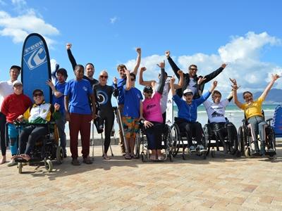 The Adaptive Surfing contestants cheer before the competition Excitement before the start of the Adaptive Surfing competition