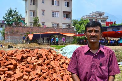 Principal of Sunrise School Mr. Surendra Maharjan, Principal of Sunrise School, by the new school site in Kathmandu, Nepal