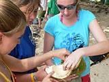 Eating the coconut flesh