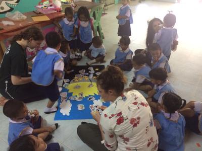 Andrea playing with the children at a day care centre Andrea playing with the children at a day care centre