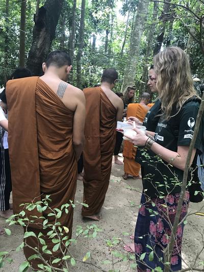 CVolunteers presenting gifts to the monks in Thailand Volunteers presenting gifts to the monks in Thailand