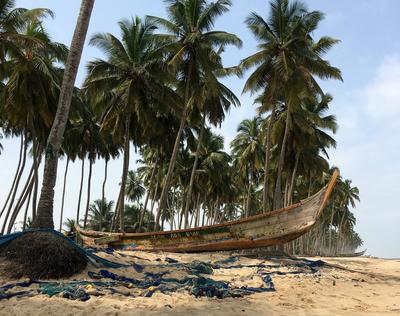 A boat on the shore in Ghana A boat on the shore in Ghana