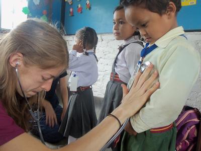 Hannah working with children at her placement Hannah working with children at her placement