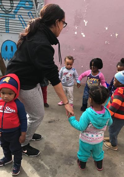 Heidi playing games with young children in South Africa Heidi playing games with young children in South Africa