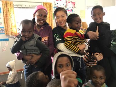 Jenny with children from her Care and Community placement Jenny with children from her Care and Community placement