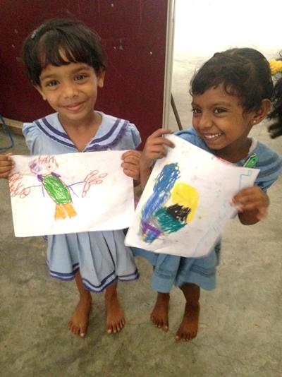 Sri Lankan children show off their art work Sri Lankan children show off their art work