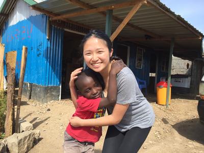 Jocy hugging a child in Kenya Jocy hugging a child in Kenya