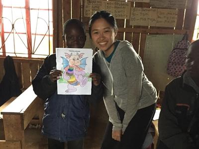 Jocy with a child at a Care placement Jocy with a child at a Care placement