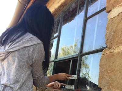 Repairing window panes at a Care placement Repairing window panes at a Care placement