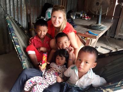 Katerina with the local kids in Cambodia Katerina with the local kids in Cambodia