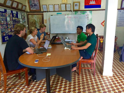 Micro-finance volunteers having a meeting with the staff Micro-finance volunteers having a meeting with the staff