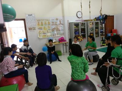 Occupational Therapy volunteer working with the locals at the community village in Hanoi Occupational Therapy volunteer working with the locals at the community village in Hanoi