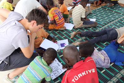 Volunteers working the children in Senegal Volunteers working the children in Senegal