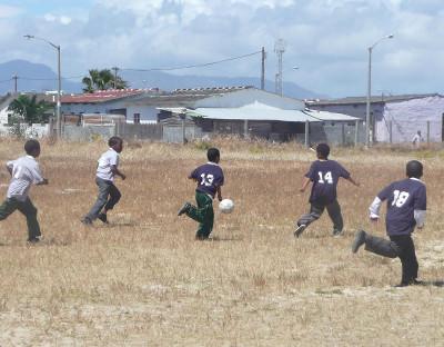Playing football Playing football