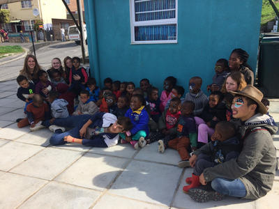 Volunteers spending time with local children Volunteers spending time with local children