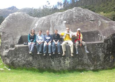 Volunteer group on rock Volunteer group on rock