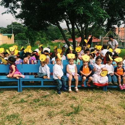 Children wearing handmade lion masks at the daycare centre Children wearing handmade lion masks at the daycare centre