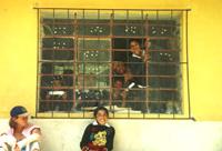 Children through classroom window in Calca Children through classroom window in Calca