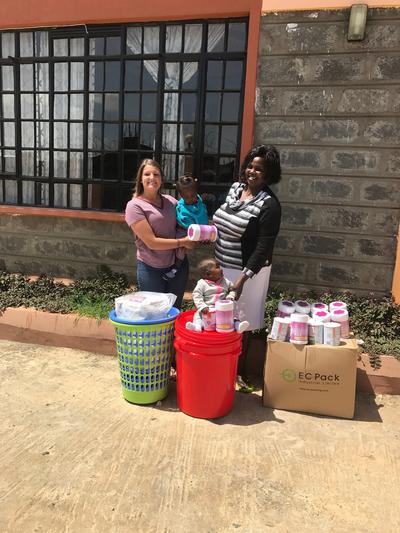 Emilee with the products she donated to the care centre Emilee with the products she donated to the care centre