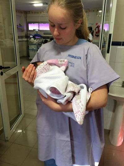 Holding a newborn baby at a hospital in Argentina Holding a newborn baby at a hospital in Argentina