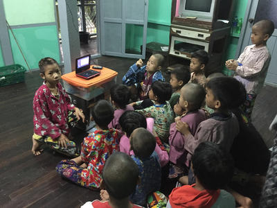 Children at a Care placement watching a DVD together Children at a Care placement watching a DVD together