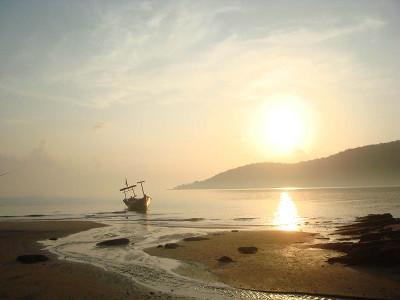 Watching the sunset at a beach in Cambodia Watching the sunset at a beach in Cambodia