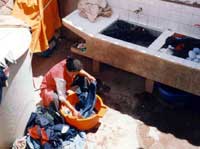 Elsa doing the family's weekly washing