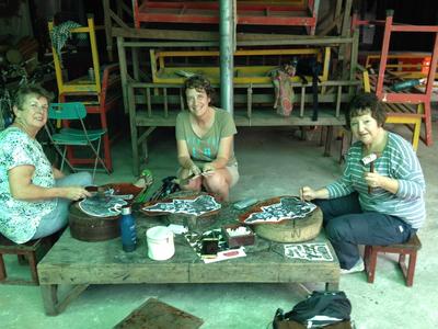 Grown-up Special volunteers making shadow puppets in Cambodia Grown-up Special volunteers making shadow puppets in Cambodia