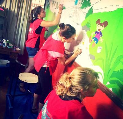 Painting a Mural at the Day Care Painting a Mural at the Day Care